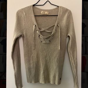 tan sweater